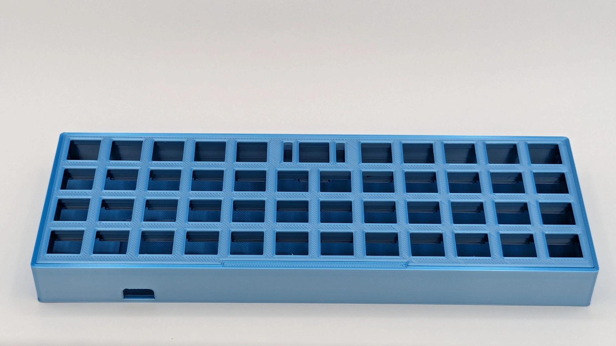 Sleepy Keeb in Blue-Silver Silk full. Back view.